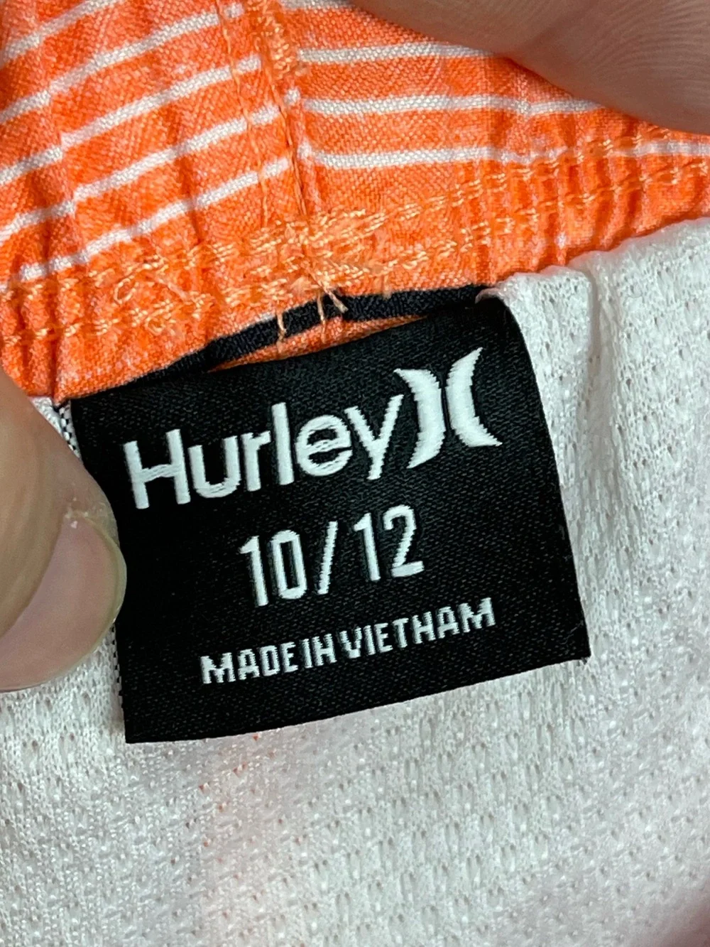 Hurley boys swim trunks size 10/12 orange stripes